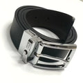 Loja men's shiny leather belt with polished silver buckle rolled on white background