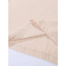 Close-up of beige fabric with detailed stitching showing soft and smooth texture