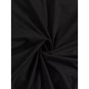 Close-up of black fabric with soft texture twisted in a swirl pattern